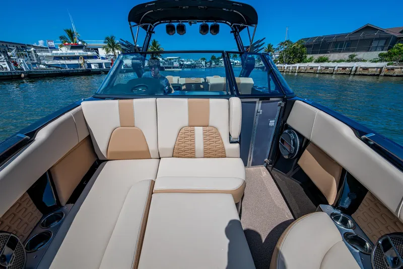  Yacht Photos Pics 2022 MasterCraft X26 boat interior with luxurious seating and modern design.