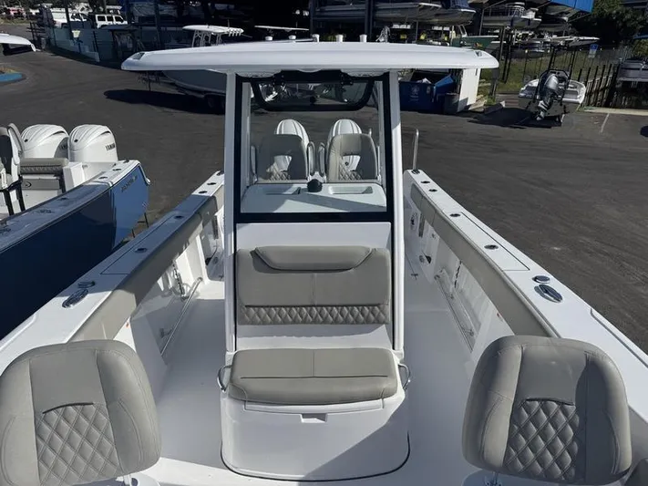  Yacht Photos Pics 2025 Sportsman Heritage 26 boat interior with modern seating and console design.