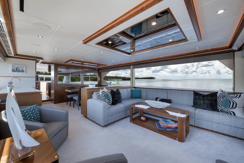 Live Mas Yacht Photos Pics Luxurious interior of 2017 Ocean Alexander 85 E yacht with elegant seating and ocean view.