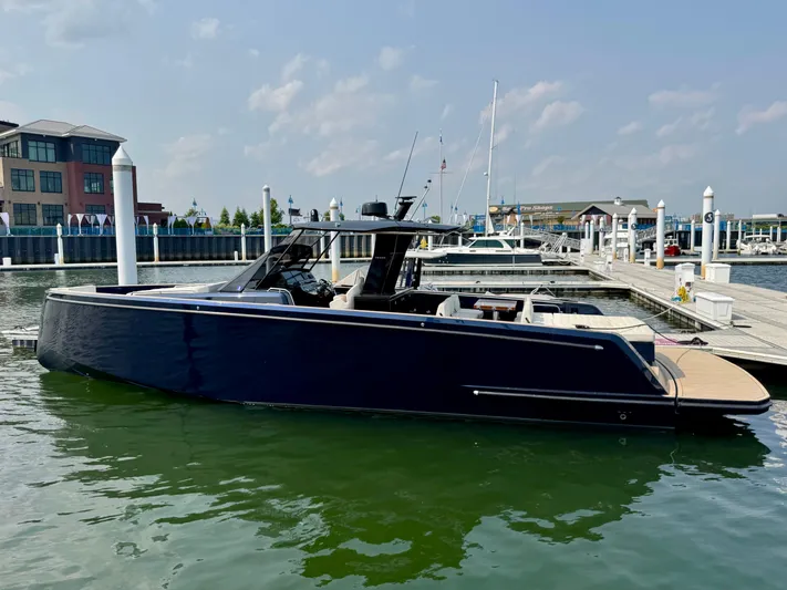  Yacht Photos Pics 2021 Pardo Yachts 43 docked at a marina, showcasing sleek design and luxury features.