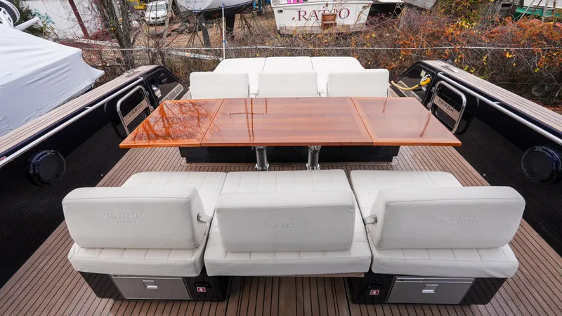  Yacht Photos Pics Luxury seating area on 2021 Pardo Yachts P43 with elegant wooden table.