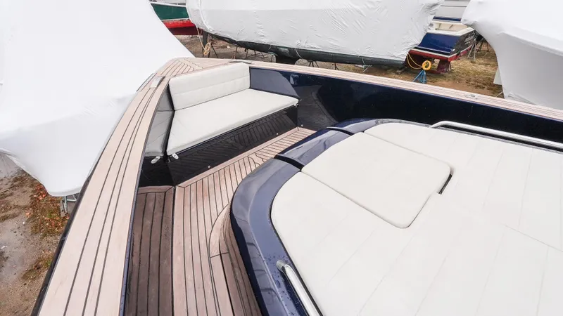  Yacht Photos Pics 2021 Pardo Yachts P43 deck with sleek seating and elegant wood finish.