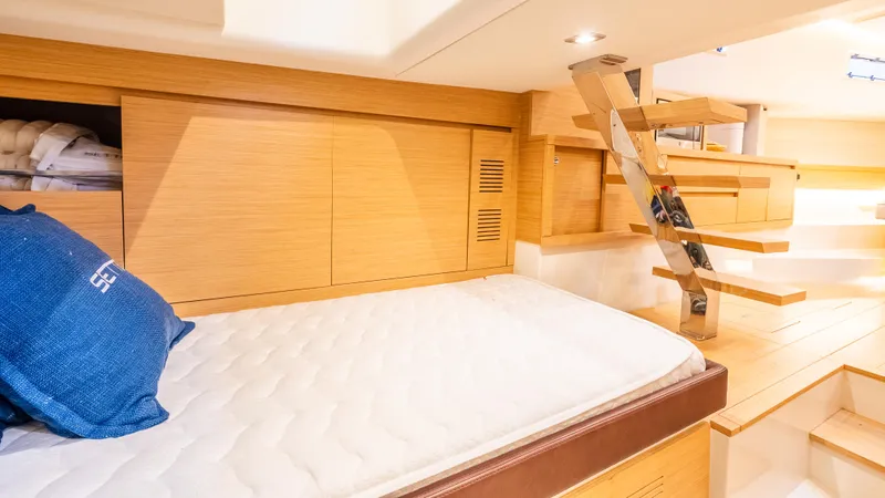  Yacht Photos Pics Luxurious cabin interior of 2021 Pardo Yachts P43 with wooden finishes and modern design.