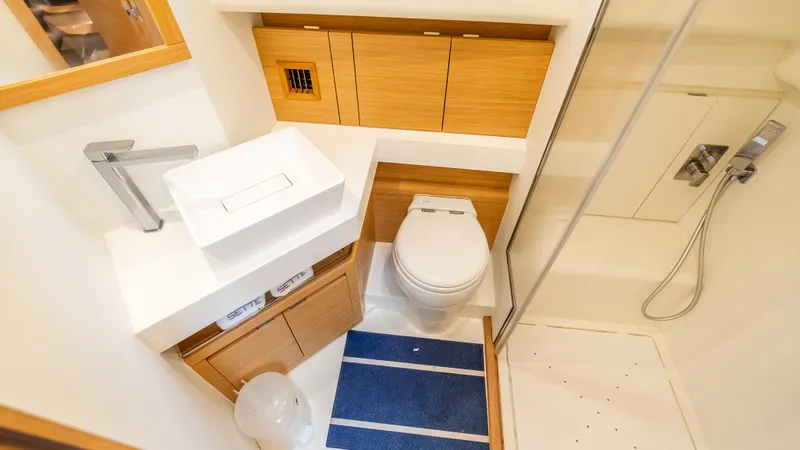  Yacht Photos Pics Modern bathroom in 2021 Pardo Yachts P43, featuring sleek fixtures and compact design.