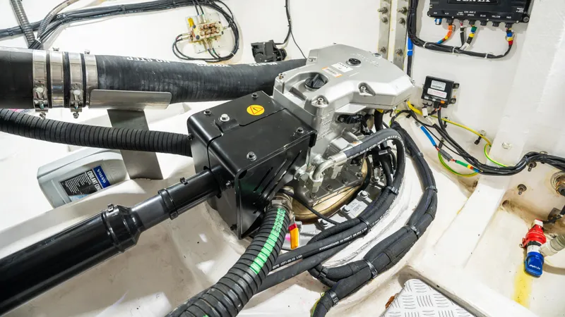  Yacht Photos Pics Engine compartment of 2021 Pardo Yachts P43, showcasing mechanical components and wiring.