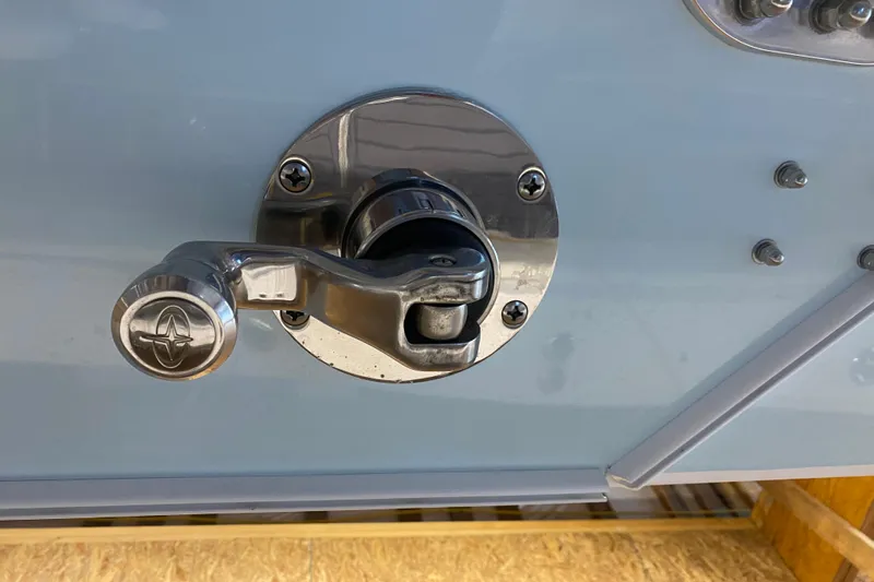  Yacht Photos Pics Chrome handle on 2022 Front Runner 39 CC boat, close-up view.