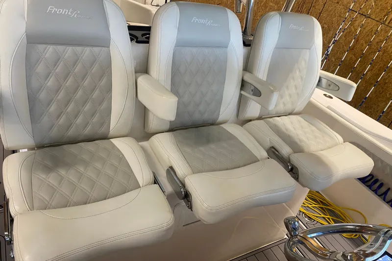  Yacht Photos Pics Luxury seating on 2022 Front Runner 39 CC boat with quilted upholstery.