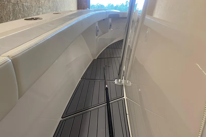  Yacht Photos Pics 2022 Front Runner 39 CC boat interior with sleek deck and railing.