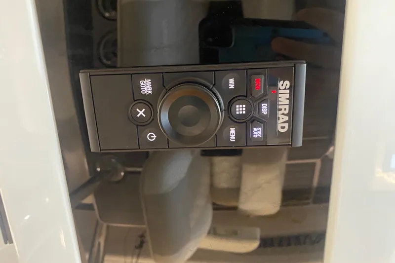  Yacht Photos Pics Simrad control panel on 2022 Front Runner 39 CC boat dashboard.