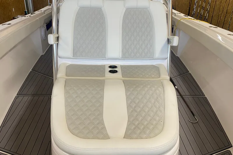  Yacht Photos Pics 2022 Front Runner 39 CC boat interior with cushioned seating and cup holders.