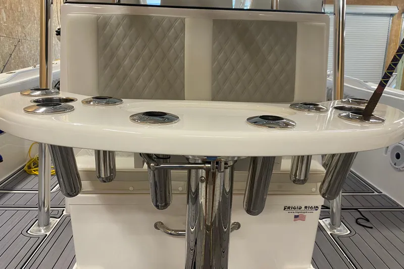  Yacht Photos Pics 2022 Front Runner 39 CC boat interior with rod holders and cushioned seating.