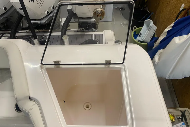  Yacht Photos Pics Open storage compartment on 2022 Front Runner 39 CC boat, featuring a transparent lid.