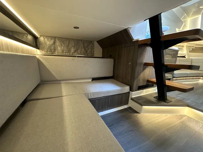 37 Sea Ray Sundancer Ob 2023 Yacht Photos Pics 2023 Sea Ray Sundancer 370 OB interior with modern seating and stylish wooden stairs.