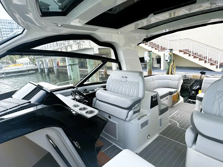 37 Sea Ray Sundancer Ob 2023 Yacht Photos Pics 2023 Sea Ray Sundancer 370 OB interior with luxurious seating and modern design.