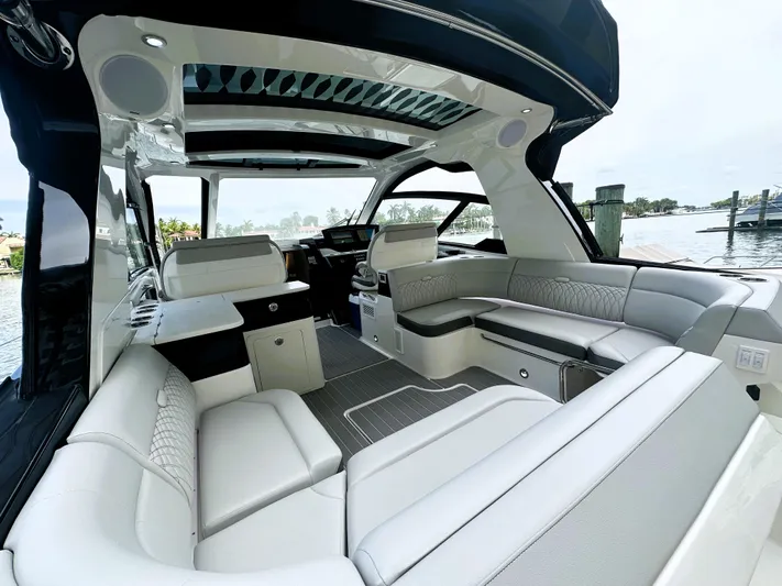 37 Sea Ray Sundancer Ob 2023 Yacht Photos Pics Luxurious interior of 2023 Sea Ray Sundancer 370 OB yacht with elegant seating and modern design.