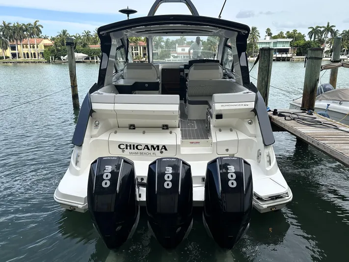 37 Sea Ray Sundancer Ob 2023 Yacht Photos Pics 2023 Sea Ray Sundancer 370 OB with triple 300 horsepower engines docked at a marina.