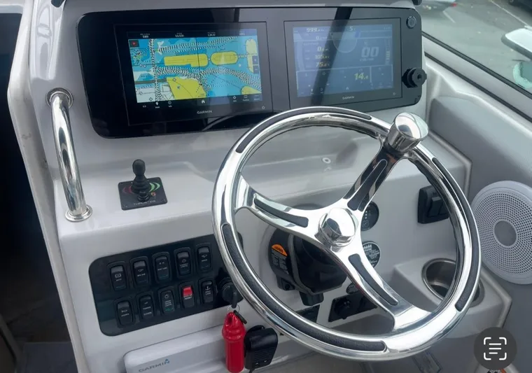  Yacht Photos Pics 2024 Regal 26 XO boat dashboard with modern navigation and control systems.