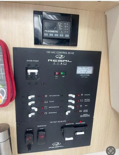  Yacht Photos Pics 2024 Regal 26 XO control panel with Dometic display, showcasing electrical system features.