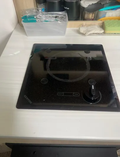  Yacht Photos Pics 2024 Regal 26 XO boat kitchen with Kenyon electric cooktop.