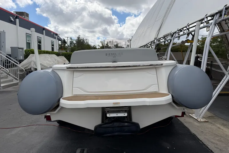  Yacht Photos Pics 2023 Williams Jet Tenders Dieseljet 625, rear view, docked under cloudy sky.