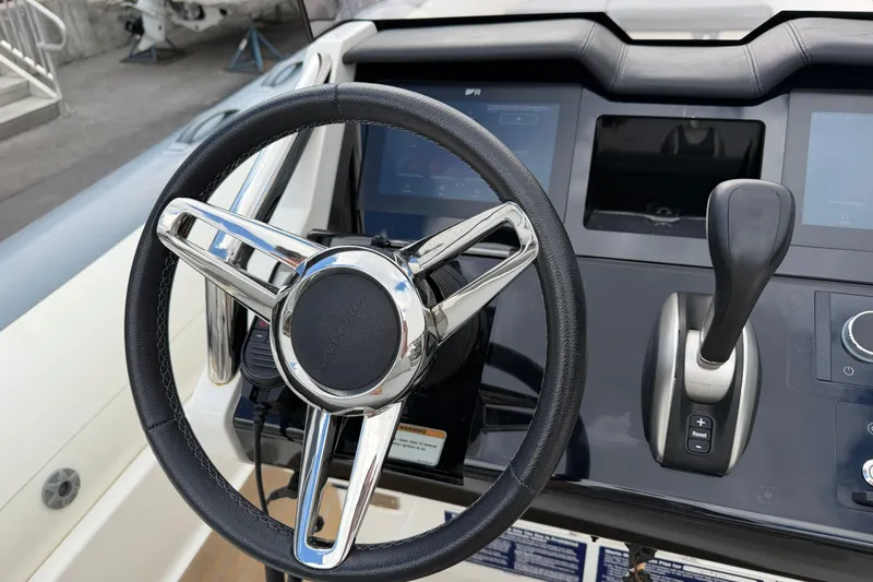  Yacht Photos Pics Steering wheel and controls of 2023 Williams Jet Tenders Dieseljet 625 boat.
