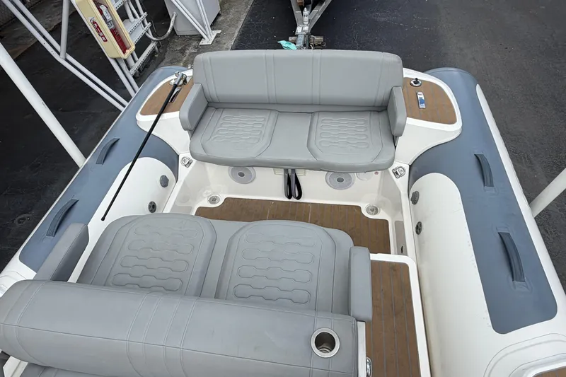  Yacht Photos Pics 2023 Williams Jet Tenders Dieseljet 625 interior with gray seating and wood accents.