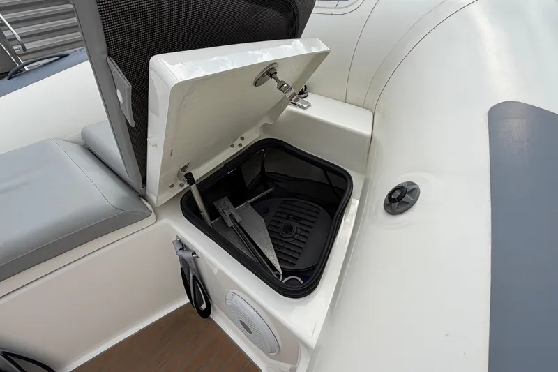  Yacht Photos Pics 2023 Williams Jet Tenders Dieseljet 625 storage compartment with anchor and accessories.