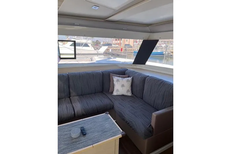 Akua Yacht Photos Pics Interior of 2018 Fountaine Pajot Helia 44 Evolution yacht with cozy seating area.