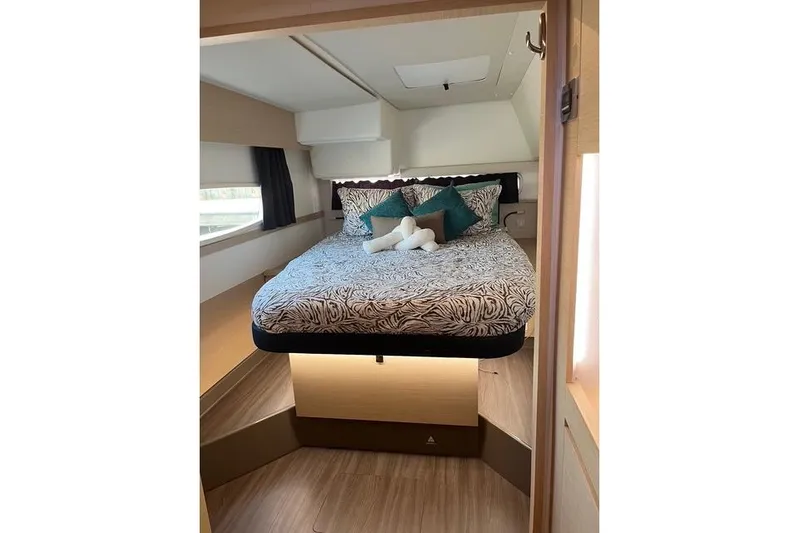 Akua Yacht Photos Pics Interior cabin of 2018 Fountaine Pajot Helia 44 Evolution with cozy bed and modern decor.