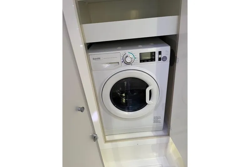 Akua Yacht Photos Pics Washing machine inside 2018 Fountaine Pajot Helia 44 Evolution yacht cabinet.