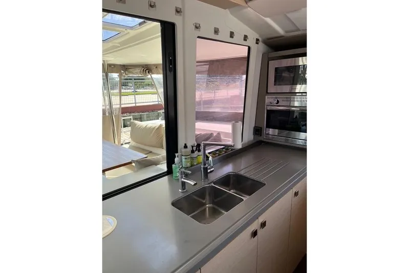 Akua Yacht Photos Pics Modern kitchen interior of 2018 Fountaine Pajot Helia 44 Evolution catamaran.
