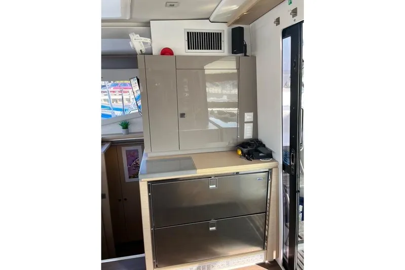 Akua Yacht Photos Pics Interior of 2018 Fountaine Pajot Helia 44 Evolution yacht, featuring modern cabinetry and appliances.