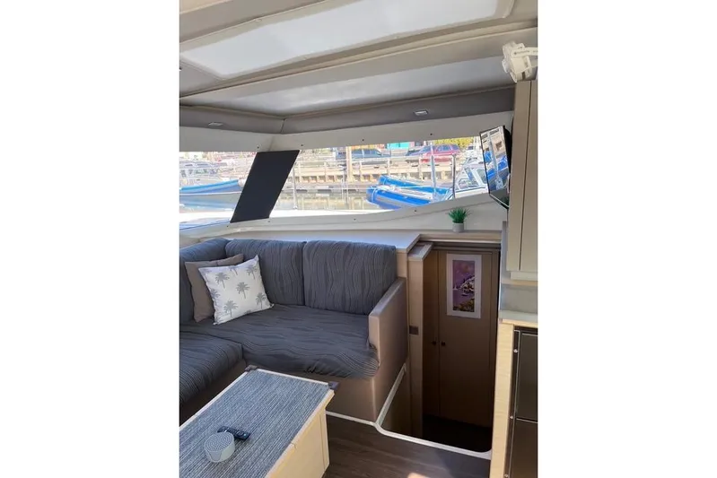 Akua Yacht Photos Pics Interior of 2018 Fountaine Pajot Helia 44 Evolution catamaran with cozy seating and modern decor.