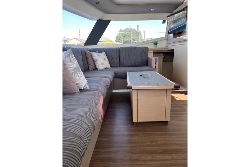 Akua Yacht Photos Pics Luxurious interior of 2018 Fountaine Pajot Helia 44 Evolution catamaran with cozy seating area.