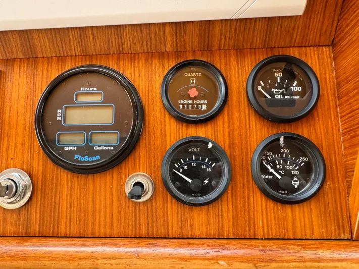 Dyer Need Yacht Photos Pics Instrument panel of a 1996 Kadey-Krogen 48 boat with various gauges.
