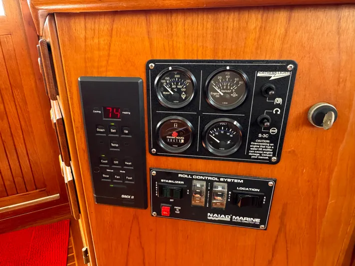 Dyer Need Yacht Photos Pics Control panel of a 1996 Kadey-Krogen 48 yacht with gauges and systems.