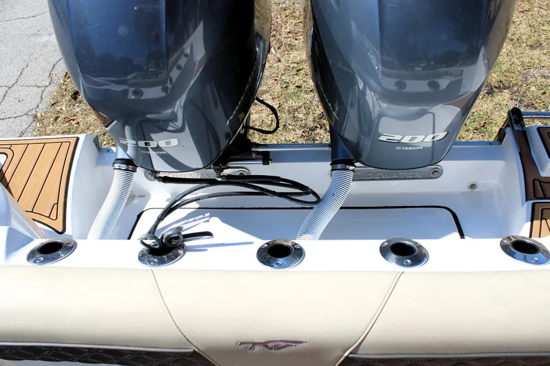  Yacht Photos Pics 2022 Tidewater 272 CC Adventure boat with dual Yamaha 200 engines.