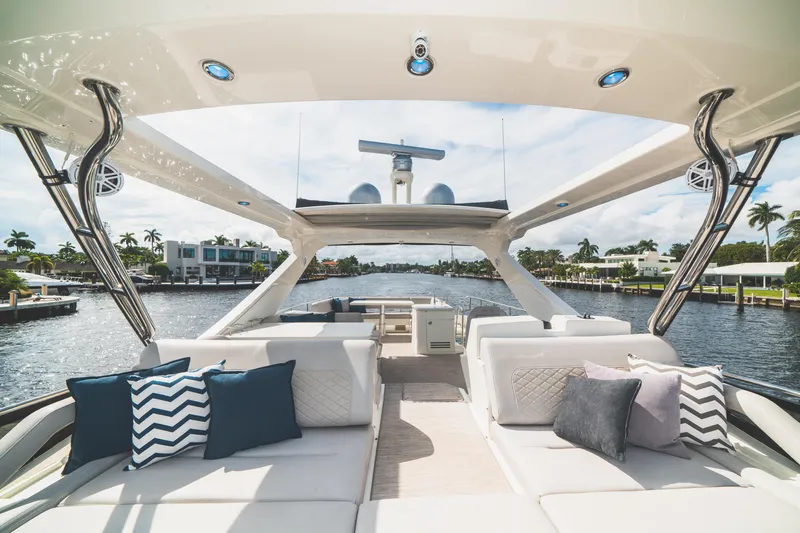  Yacht Photos Pics Luxurious 2017 Sea Ray L650 Fly yacht interior with plush seating and scenic waterfront view.