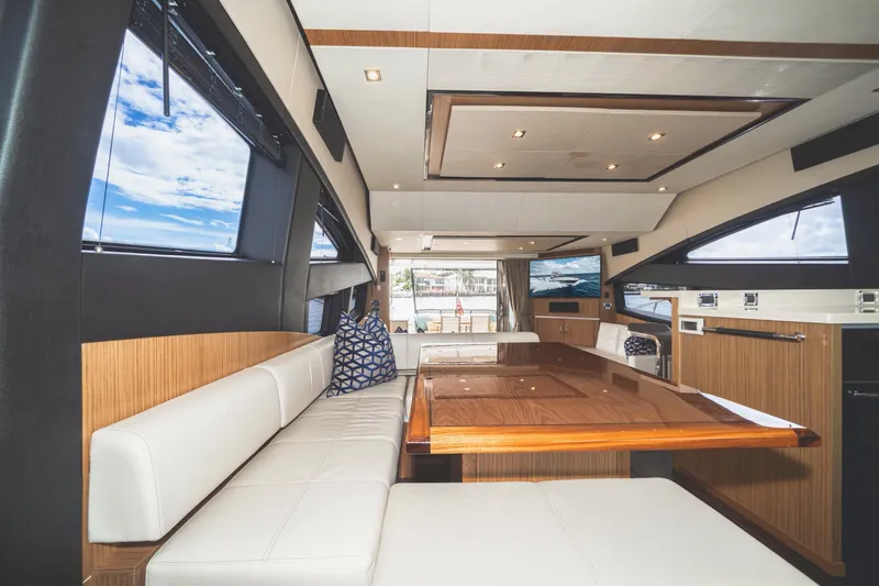  Yacht Photos Pics Luxurious interior of 2017 Sea Ray L650 Fly yacht with elegant seating and modern design.