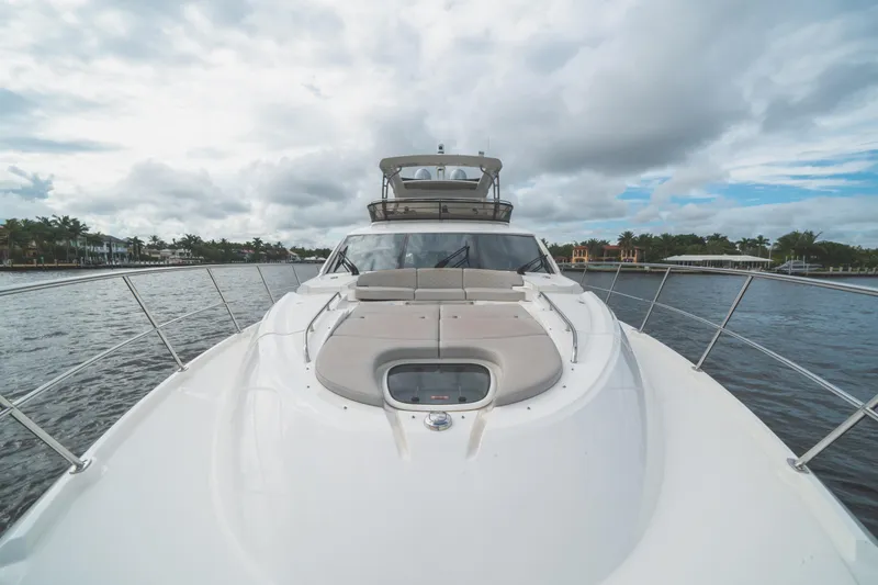  Yacht Photos Pics 2017 Sea Ray L650 Fly yacht on water under cloudy sky.