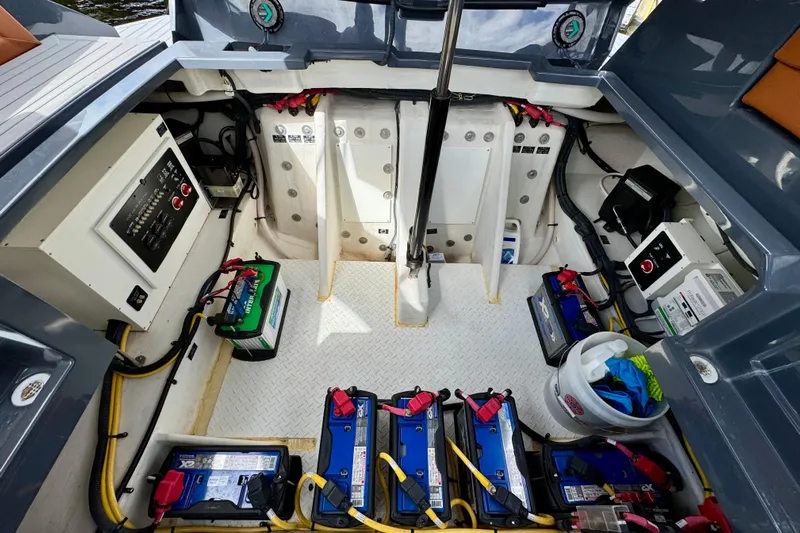  Yacht Photos Pics 2022 Cruisers Yachts 338 South Beach Edition Bow Rider engine compartment with batteries and wiring.