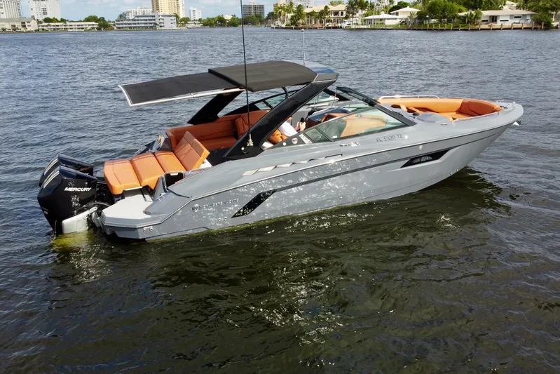  Yacht Photos Pics 2022 Cruisers Yachts 338 South Beach Edition Bow Rider on water, featuring sleek design.