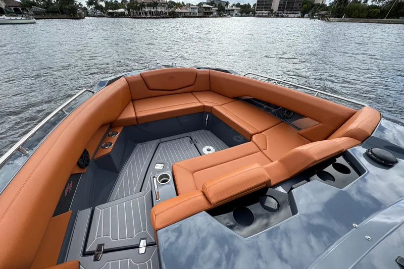  Yacht Photos Pics 2022 Cruisers Yachts 338 South Beach Edition Bow Rider with luxurious seating on water.