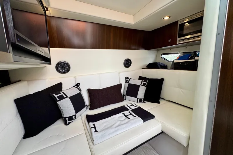  Yacht Photos Pics Luxurious interior of 2022 Cruisers Yachts 338 South Beach Edition Bow Rider with stylish cushions.