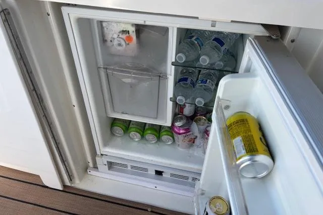  Yacht Photos Pics Mini fridge stocked with drinks on 2004 Cruisers Yachts 370 Express.