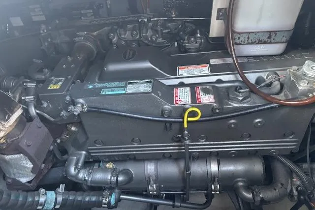  Yacht Photos Pics Engine compartment of a 2004 Cruisers Yachts 370 Express, showcasing mechanical components.