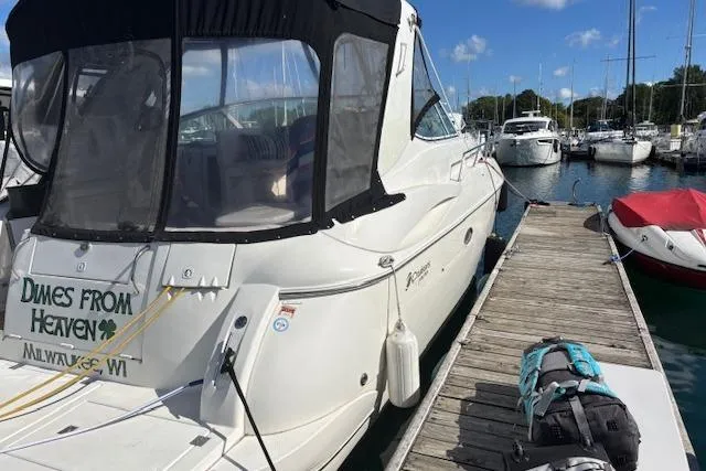  Yacht Photos Pics 2004 Cruisers Yachts 370 Express docked at marina, sunny day, Milwaukee, WI.