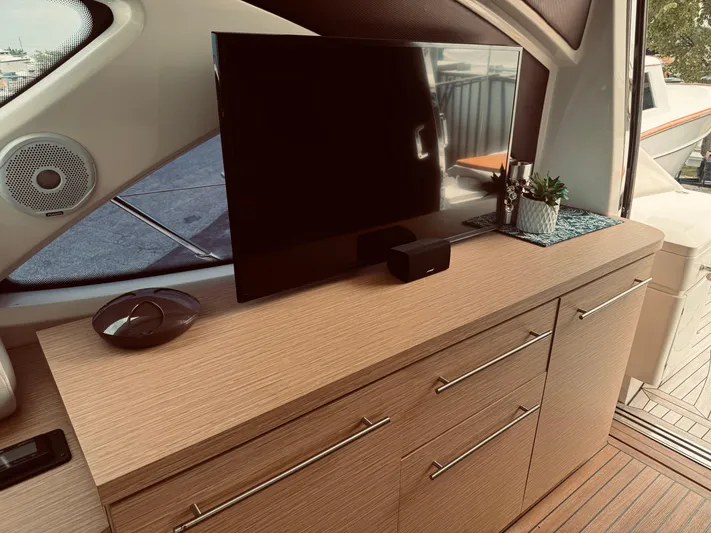  Yacht Photos Pics Interior of 2009 Azimut Atlantis 50 yacht with TV and modern cabinetry.