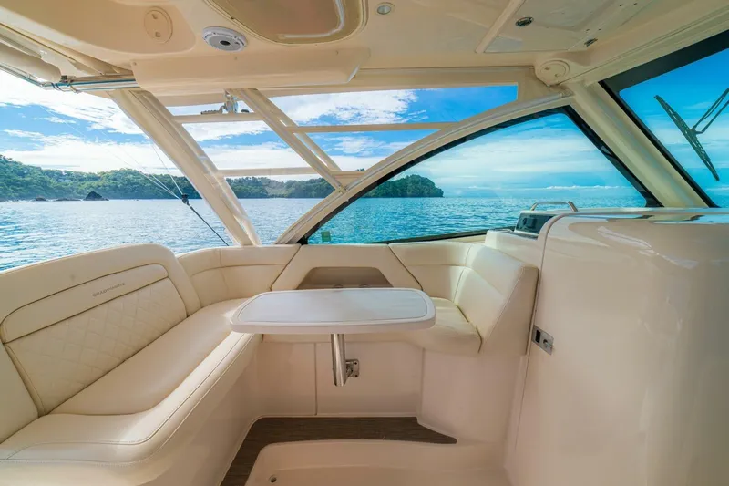 Dos Amigos Yacht Photos Pics Luxurious interior of 2020 Grady-White Freedom 375 boat with ocean view.
