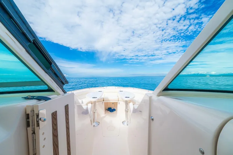 Dos Amigos Yacht Photos Pics 2020 Grady-White Freedom 375 boat deck with ocean view under blue sky.